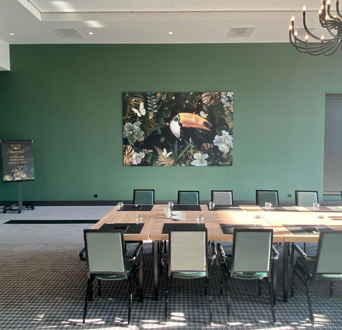 The horizontal Toekan artwork in the quiet conference room