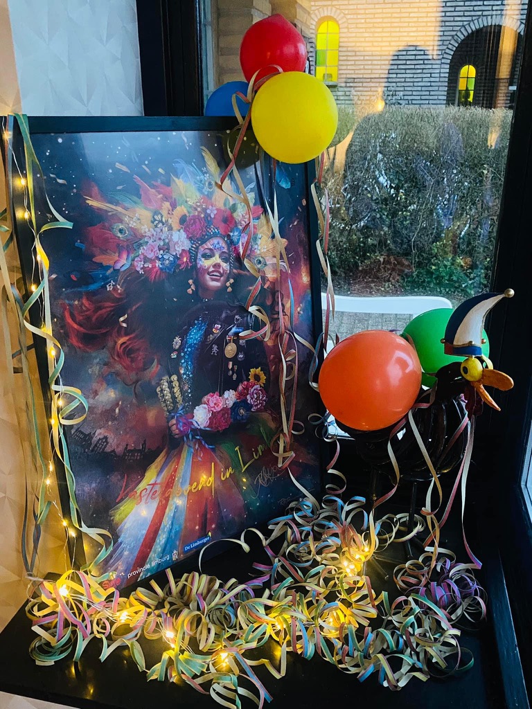 Carnival poster in a window with balloons and streamers